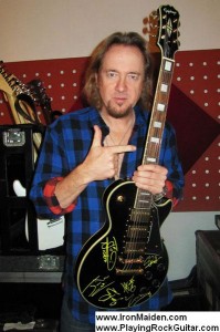 PlayingRockGuitar_Adrian_Smith_auction